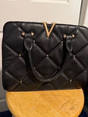 Black Quilted Top-Handle Satchel with Gold V Accent